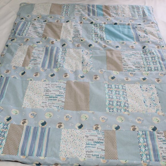 Homemade blue themed quilted baby blanket back is grey fleece. - Picture 3 of 5
